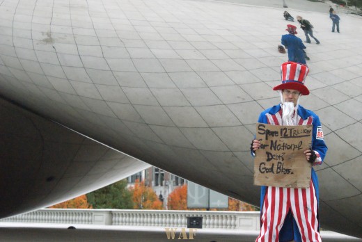 Uncle Sam at Chicago's Millennium Ball with a sign asking for National Debt money
