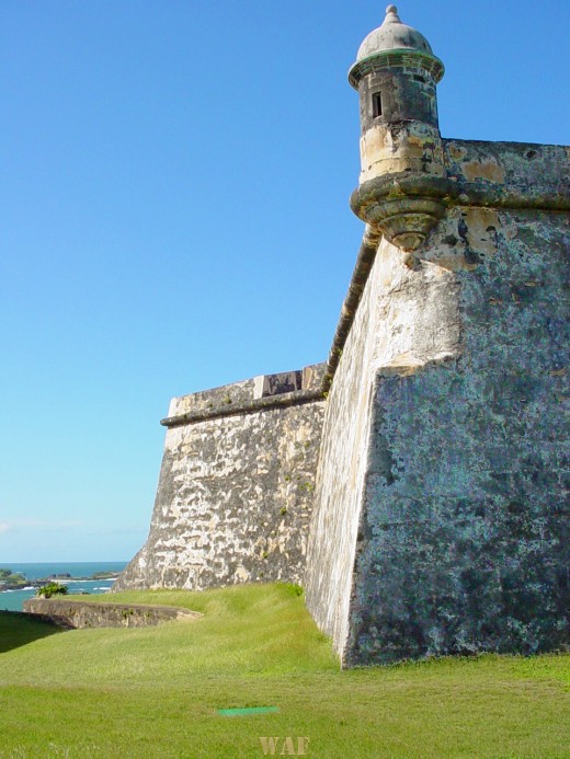 Old San Juan's fortress wall and tower at the water in Puerto Rico