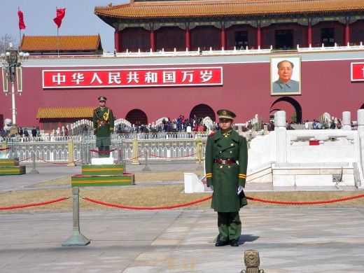 guards in front of the entrance to the Forbidden City, by Tiananmen Square (Beijing, China)